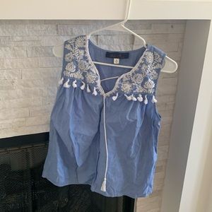 Blue sleeveless blouse